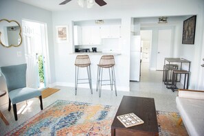 The newly renovated unit is on the first floor of a 2 story waterfront building.
You will notice the beautifully designed decor immediately upon entering this bright vacation space!  The inside and outside has been been freshly repainted.