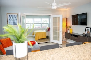 The bright and airy living room overlooks the master bedroom and the intercoastal. Large TV with cable. Unit has excellent Wifi.
YouTube TV/ Rokus are on all 3 TVs in the unit.