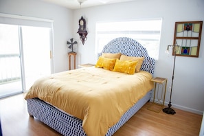 This guest bedroom has the most comfortable queen size bed. There are room darkening shades on the windows and on the sliding glass doors.
Extra blankets are available.
There is a 32 inch TV with Roku (Smart TV).