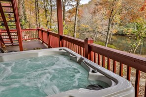 Hot tub overlooking waterfront 