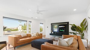 Living room w smart tv, fireplace, 2 sofas, Capitol view & power blinds