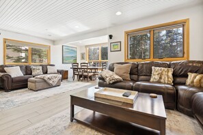 Large and spacious living area with comfortable seating for all 12 in your group and Queen sleeper