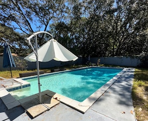 Large Oversized Pool, 9Ft Deep. 
Umbrellas for Shade while you enjoy the sun. 