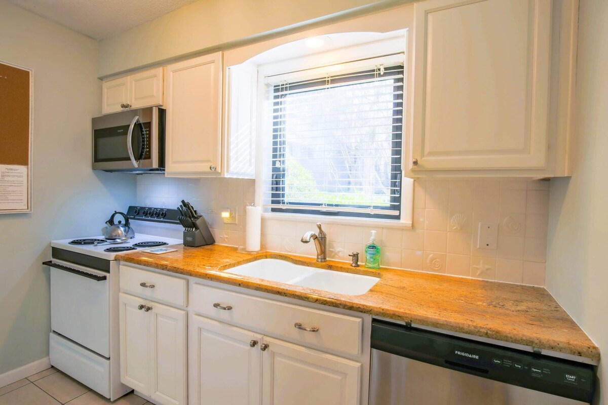 Dog Friendly Covered Patio with Garden Views; Option to Buy Seabrook Beach Club Amenity Cards