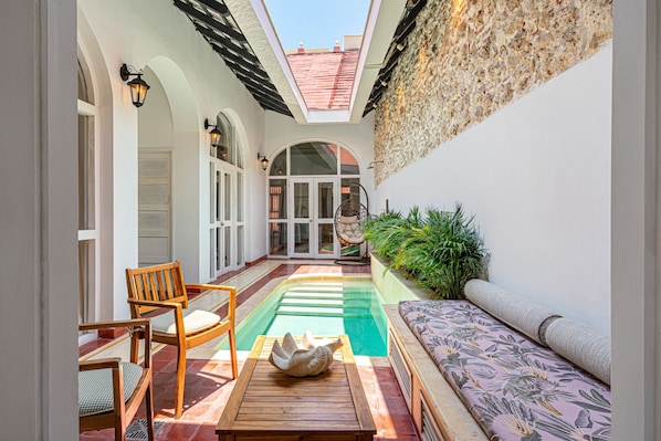 Outdoor furniture at the private pool for an afternoon chill