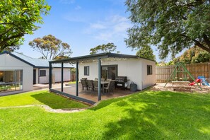 The secure back yard is ideal for keeping children and pets safe while they play.