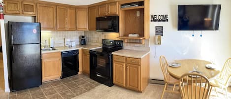 Welcome to Mountain Lodge 215, featuring an extended kitchen and a brand new deck!