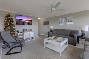 Kick back in the living room and unwind in front of the 57" Smart TV!