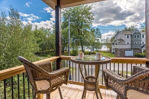 Enjoy your morning coffee from the spacious front porch.