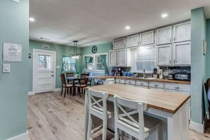  kitchen with island seating, & fully equipped 