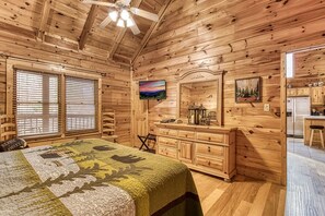 King size bed, large bedroom yet cozy, hickory wood floor, relax, whirlpool tub!