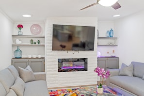 65" smart TV and electric fireplace 