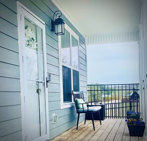 Sit on the front porch and enjoy the views. The Upstairs Unit Is Always Vacant.