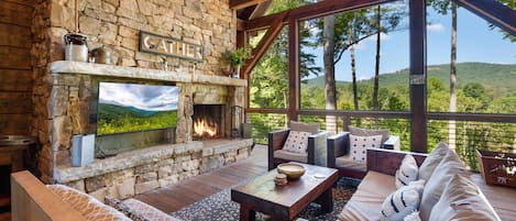 Copperline Lodge - Deck Lounge with TV and Wood Burning Fireplace