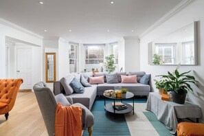 Relax and unwind in our cozy living area, thoughtfully designed for your comfort. Sink into plush sofas and create unforgettable memories with loved ones.