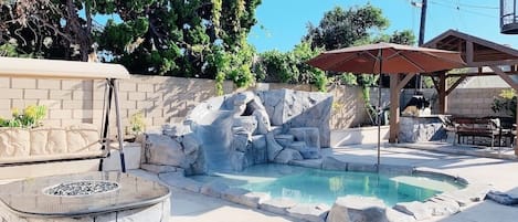 Small pool with slide/ hottub heated 