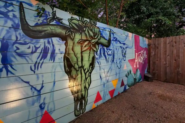 Enjoy the beautiful, award winning, 1-of-a-kind art Mural on your backyard fence