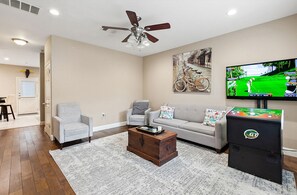 Get 2 main living areas, 1 in each side of duplex! (Golden Tee Arcade in Unit A)