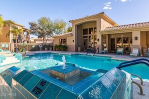 Clubhouse overlooks the Resort-Like Heated Pool and Spa