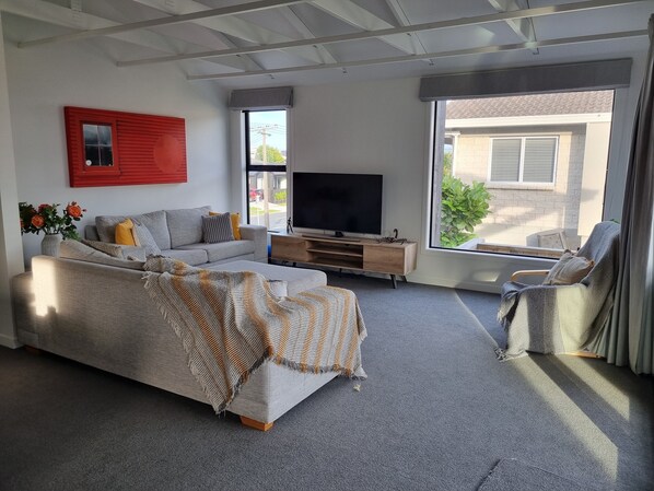 Lounge - opens onto deck and back yard.