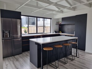 Kitchen - opens onto deck and backyard