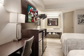 Unit with a flat-screen TV, microwave and mini-fridge