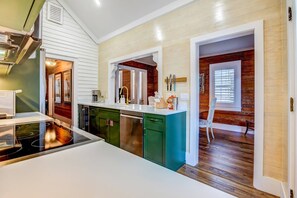 The convenient pass-through in the kitchen lets you effortlessly entertain your friends and family, ensuring that no one misses out on the fun.