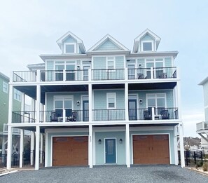 Ocean facing side. 3 sets of rocker chairs overlooking the ocean