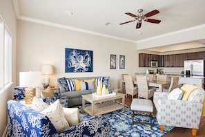 Just chill and relax with your family in this cozy and colorful living room.