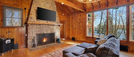 Cozy up on the couch in front of the fireplace 