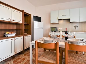 Cabinetry, Furniture, Countertop, Kitchen, Home Appliance, Wood, Orange, Interior Design, Kitchen Appliance, Food