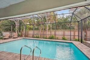 Lounge chairs by pool, very private.
