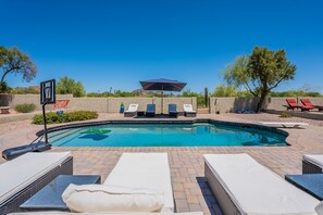 Beautiful heated pool with 10 lounge chairs to lay out on!