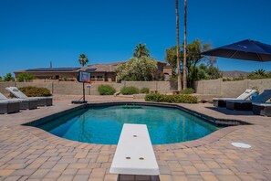  Beautiful heated pool with 10 lounge chairs to lay out on!