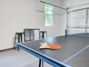 Ping pong table in garage.