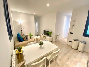 General view of the living room and dining room