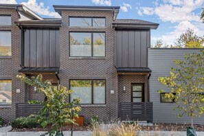 Modern and sleek, this well-situated townhome is close to everything you want to experience in Bentonville.