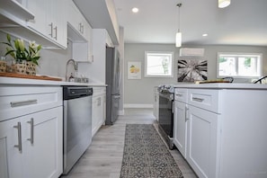 Bright, airy kitchen with stainless steel appliances.  Your condo has a drip coffee maker.