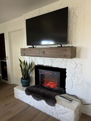 Relax by the soothing ambience of your electric fireplace! 