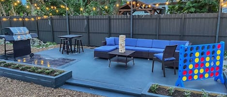 Relaxing backyard patio for the whole group to enjoy!