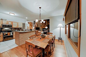Dining room opens to kitchen and provides a comfortable space for entertaining