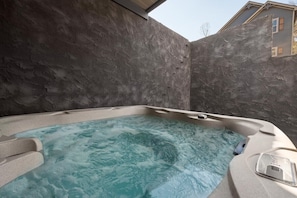 Soothe your body and soul in our inviting hot tub retreat