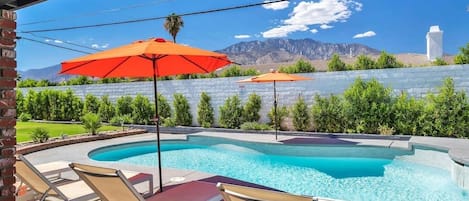 Poolside lounging with views of the gorgeous desert mountains and full size walls for privacy. 