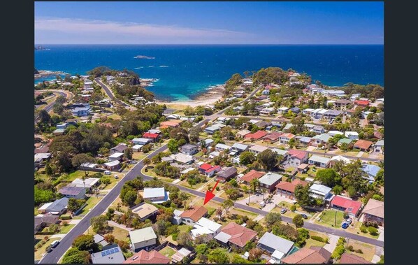 Only 400m walk to Garden Bay (pictured) and Malua Bay Surf Beach