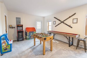 Lower Level Game Room with Multiple Game Tables