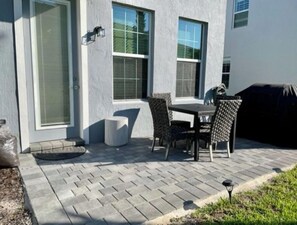 rear year with patio and BBQ