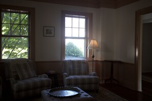 TV room with oversized chairs and 3 seater sleeper sofa