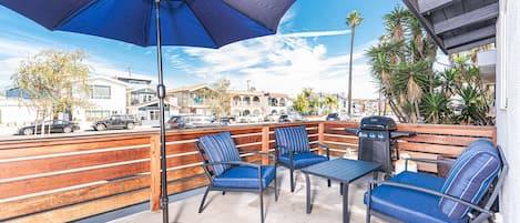 Enjoy a refreshing beach getaway in this classic Newport Beach cottage, just one house from the sand!