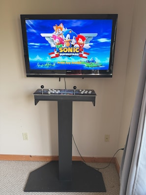Unleash your inner gamer with our retro-style arcade console! Featuring dual joysticks and a massive library of classic and modern games.