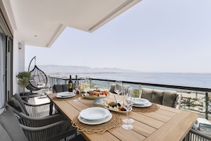 The luxury home reigns sublime above Mikrolimano Bay in Athens. 